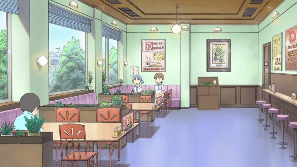 Yuuko and Mio sit quietly at a table in Daiku Burger.